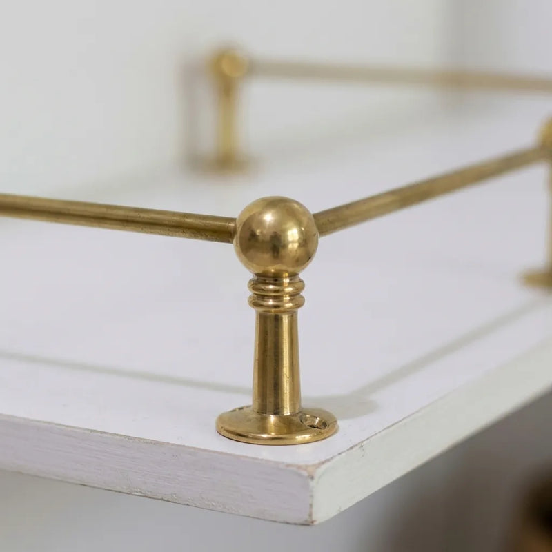 Solid brass ball post gallery rail on an open kitchen shelf – Brassdoria